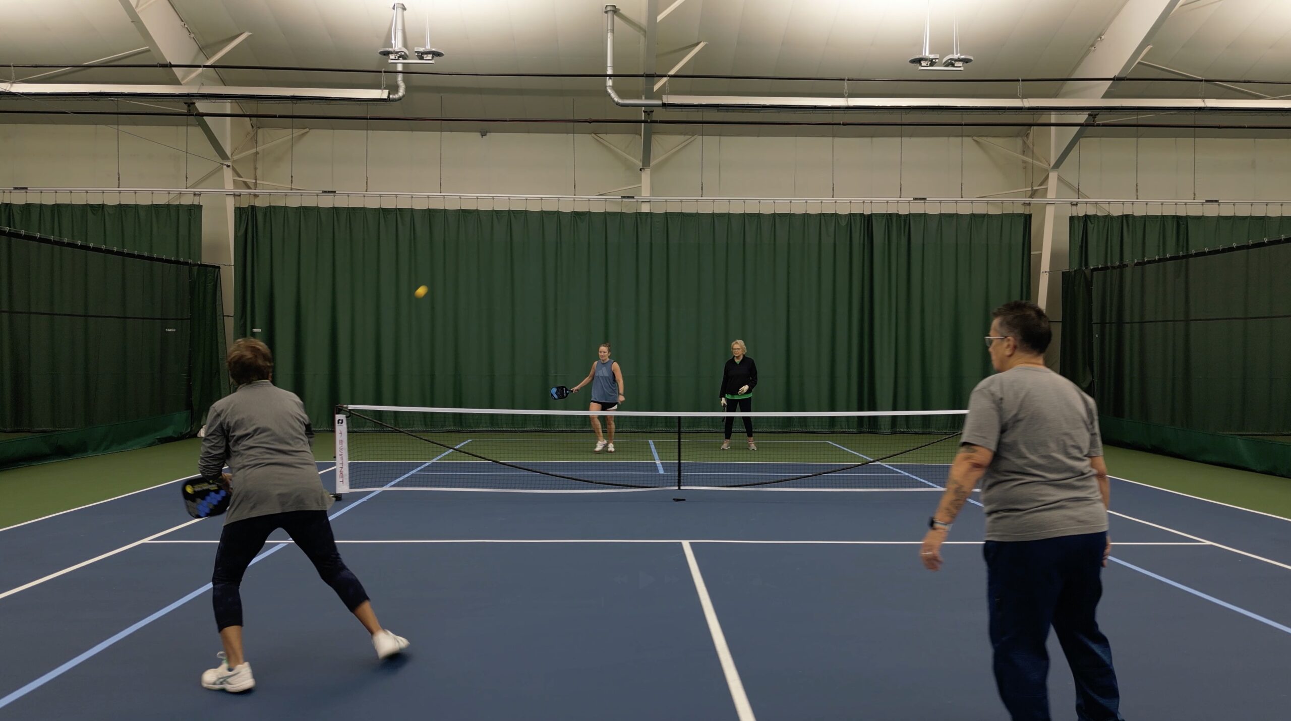 Women playing Pickleball